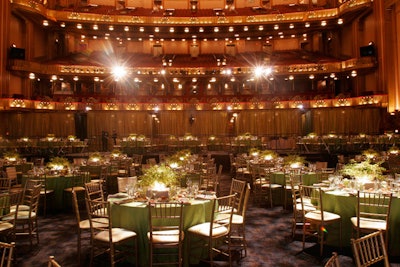 Dinner took place on a platform that covered the tops of chairs in the opera house's auditorium.
