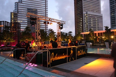 Two 16-foot bars branded with Johnnie Walker logos served as the focal point of the event space.