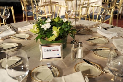 With the focus on the panel discussion, The Week planners kept the tabletop decor to simple planted centerpieces.