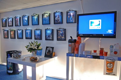 Framed issues of DirecTV's magazine, Access, hang over showcased goods, such as Snapple, Zone bars, and local roasters Mud Coffee.