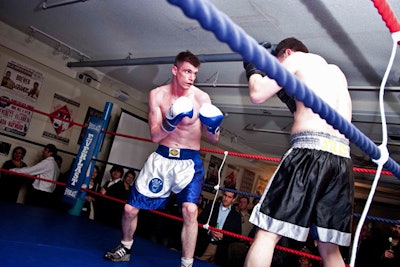 Attendees watched Canadian welterweight champion Victor Lupo in the ring.