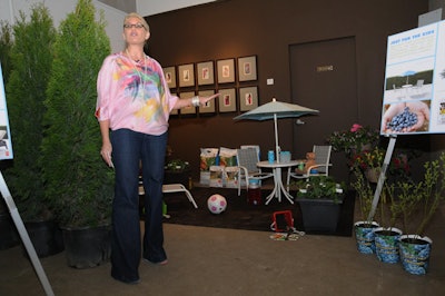 Stylist Janette Ewen spoke about each of the vignettes, which included a display featuring kid-friendly patio furniture.