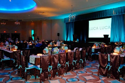 V.I.P. tables surrounded the two-prong runway in the main event space.