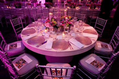 A silver palette marked the evening's decor, with bursts of color from spring flowers in bright pinks and purples.
