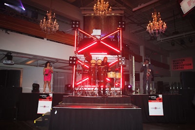 Live musicians—including a percussionist, a saxophonist, and an electric violinist—at times accompanied DJ Starting from Scratch.