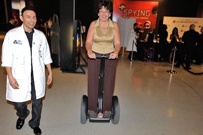 Volunteers dressed in white lab coats offered guests the chance to try out human transporters at the after-party.