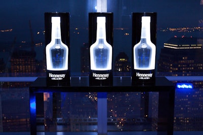 During Swizz BeatZ's performance of 'When I Step Into the Club,' darkened silhouettes of the Hennessy Black bottle began glowing.