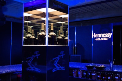 Lights shone on the cases of Hennessy Black in the second room's two bars during Swizz BeatZ's performance.
