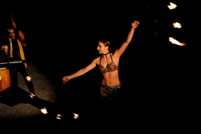 Polynesian drummers and fire dancers performed at the kickoff party on Thursday night.