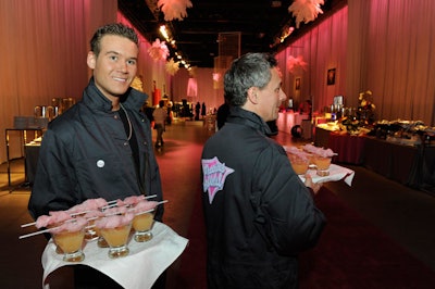 Servers in coveralls offered cotton candy martinis to guests as they arrived.