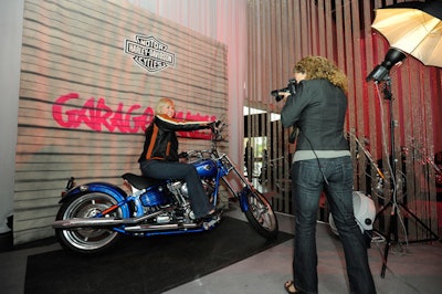Envision Digital Photography snapped take-home photos of guests sitting on a bike.