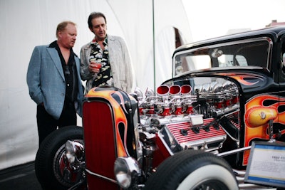 Guests examined vintage cars that served as decor.
