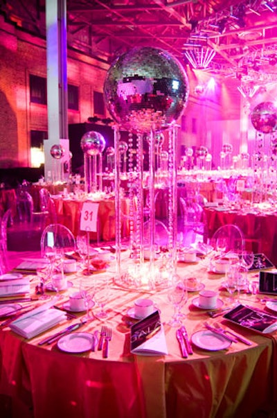Tall centrepieces topped with mirrored balls added to the '70s theme in the dining room.