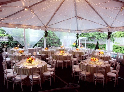 The 40- by 40-foot tent for Atlantic Media's dinner was draped with rope lights.