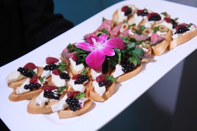 Passed hors d'oeuvres at the Associated Press reception included brie and berries on toast rounds.