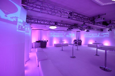 The Thomson Reuters reception featured serpentine fabric walls and an audiovisual presentation of changes in autos, inventions, and social issues.
