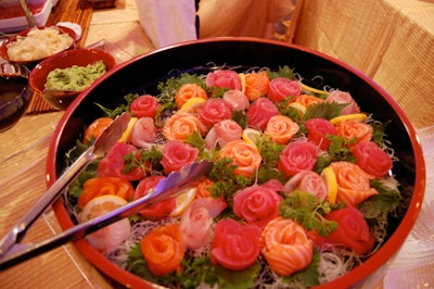 Before dinner, an appetizer station outside the ballroom offered rose-shaped sushi.