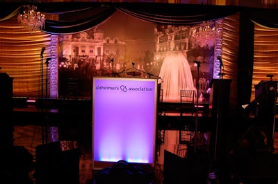 In the ballroom, an illuminated lectern bore the Alzheimer's Association's logo, and images of Monte Carlo adorned the backdrop.