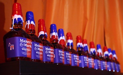 Liquor sponsor Maker's Mark decorated its bars with red, white, and blue bottles.