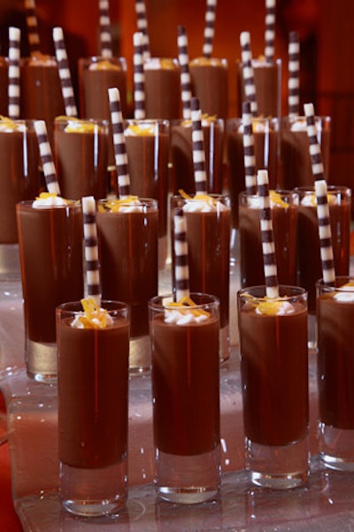 Desserts positioned at the entrance included chocolate mousse in glass flutes with candied orange peel and a chocolate straw.