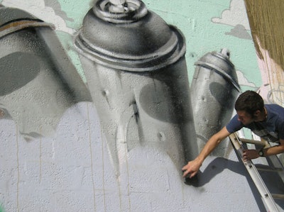 Johnny Robles and his partners painted one of the lot's walls.
