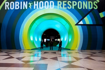 To send a strong message about its new campaign and targeted message, the foundation used a circular tunnel decorated with the bull's-eye emblem as the entry point to the event.