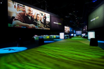 An arrow-shaped carpet ran the length of the cocktail space and enormous images from the new campaign hung overhead.