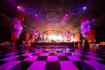 A checkered dance floor beckoned guests.