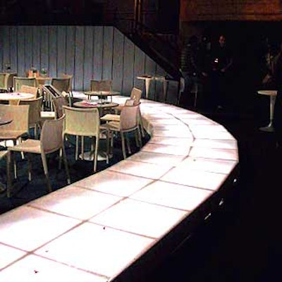 A runway lit from below circled the celebrities seated in chairs on the main floor of Hammerstein Ballroom.