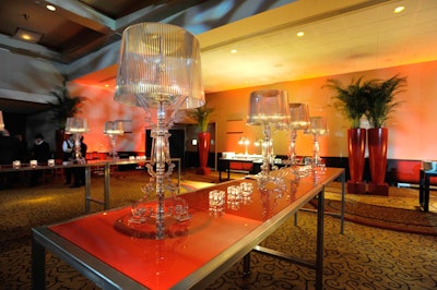 For the reception at the Westin Harbour Castle Hotel, organizers used red and gold decor to create a nightclub feel for the 1,000 guests who had purchased the silver ticket package.