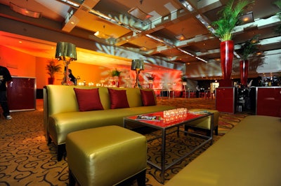 A grouping of four gold-coloured sofas provided a lounge area in front of the stage where a DJ and live band from Emporium Live entertained guests.