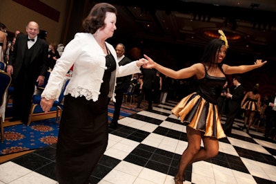 Can-can dancers from Glenn Pearson Productions mingled and danced with guests before the dinner.