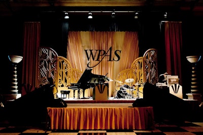 Hargrove covered the stage in red and gold draping and black and white accents.