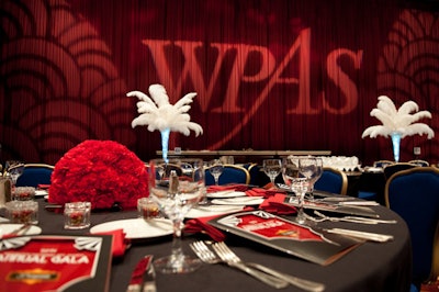 The Art Deco program design and the red, white, and black color scheme evoked the 1930s theme.