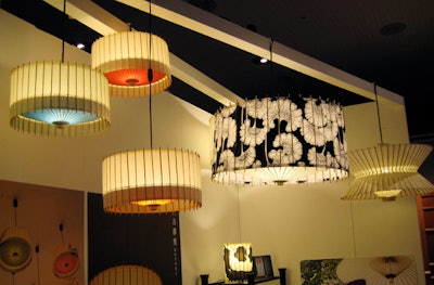 Hiyoshiya, a Kyoto-based maker of traditional Japanese umbrellas, showed its line of lampshades, which fold like umbrellas to change their shape or close, making for extra design mileage and easy storage.