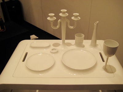 London-based Min Hoo Park's 'Unified Dining Table' incorporates a removable tray with a set of attached tableware.