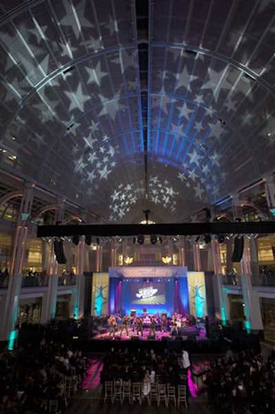 Fight for Children's Kristen Fegley eschewed a seated dinner this year, instead filling the atrium with a dance floor, chair arrangements, lounge seating areas, and highboys.