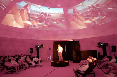 Inside a dome, 360-degree projections illuminated the space and an instructor educated the audience about the new car.