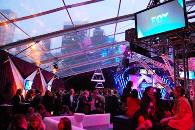 The transparent tent roof gave guests a look at the skyline throughout the party.