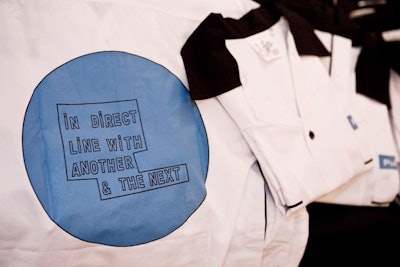 To add to the casual tone of the event, guests could don bowling shirts designed by artist Lawrence Weiner.