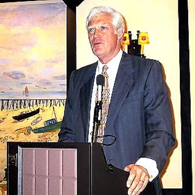 Admedia Partners president Rob Garrett addressed his guests in the front section of the banquet room at La Cote Basque.