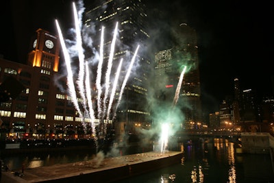 At 9:30 p.m., a barge stationed in the river set off 30 minutes of fireworks.