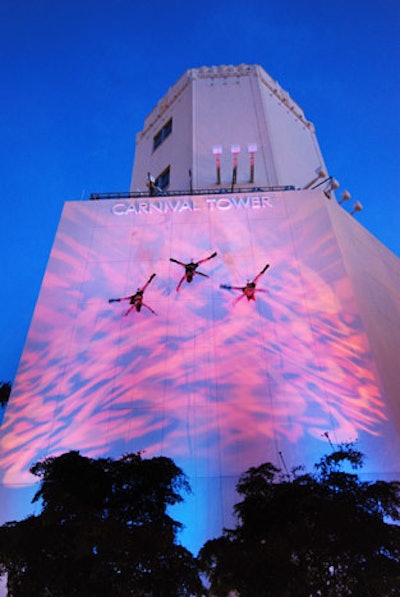 Animate Objects wall walkers performed a choreographed dance as they repelled down the side of the Arsht Center's Carnival Tower.