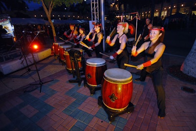 Japanese taiko drummers from Fushu Daiko provided the music as aerialists repelled down the side of the Carnival Tower.