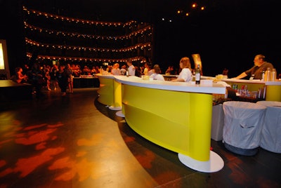 Deco Productions provided bright yellow, orange, lime green, and hot pink spandex bars in Ziff's lobby and on the stage.