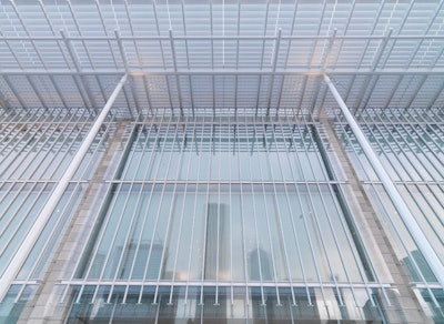 Architect Renzo Piano crowned the building in a canopy of aluminum blades that are engineered to bring northern light into the galleries, but block out the more intense southern light.