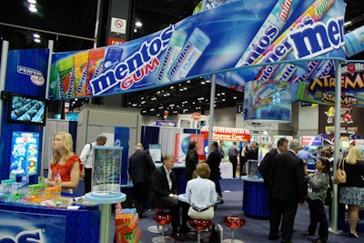 Some companies added tables to their trade show booths to allow buyers and sales reps to meet on the floor.