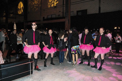 Male servers in pink tutus at the Canadian premiere of Sex and the City in Toronto in May 2008