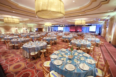 Turquoise linens and red tulips lent a springtime look to the Ritz-Carlton ballroom.