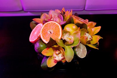 Dalzell's Lauren Gregory created the lounge centerpieces, which mixed orchids, oranges, lemons, limes, moss, and grass.